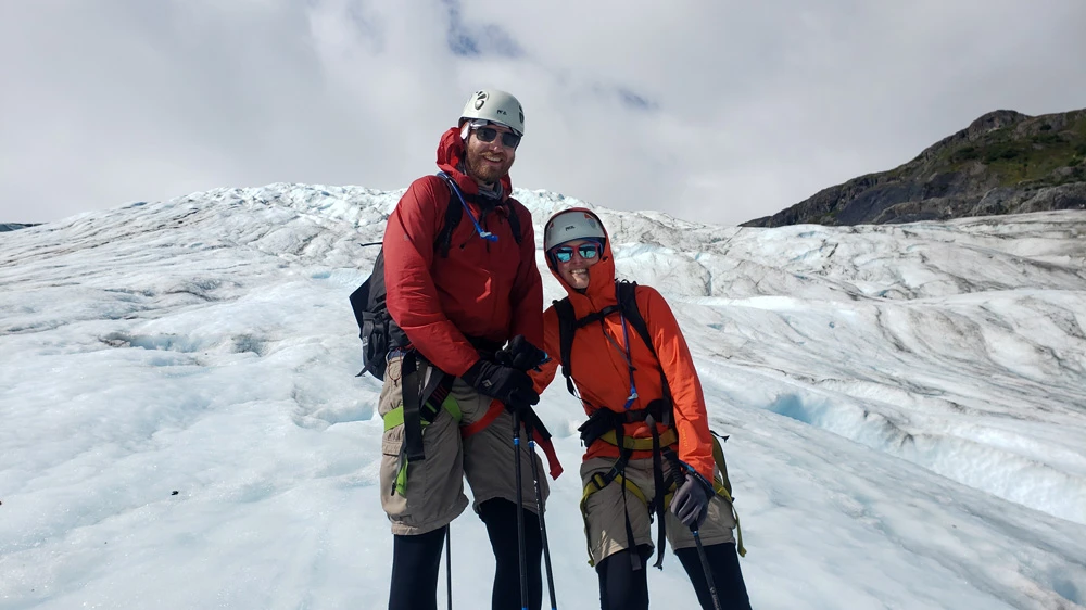 Photographer Tyler W. Green walking on a glacier in Alaska